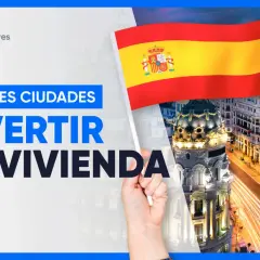 Bandera española ondea sobre edificios emblemáticos, destacando las ciudades más caras de España para invertir en vivienda.