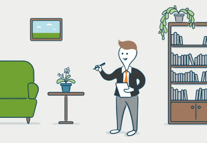 Un hombre con traje revisa un bien inmueble, con un sillón verde, una planta y una estantería llena de libros.
