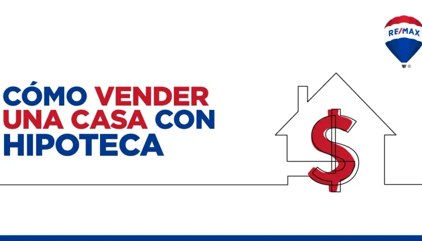 Guía para vender piso con hipoteca. Casa con símbolo de dólar y globo aerostático RE/MAX.