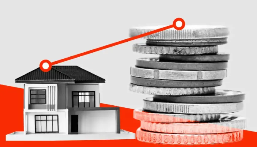 Casa y pila de monedas con línea ascendente. El impuesto segunda vivienda puede afectar tus finanzas.